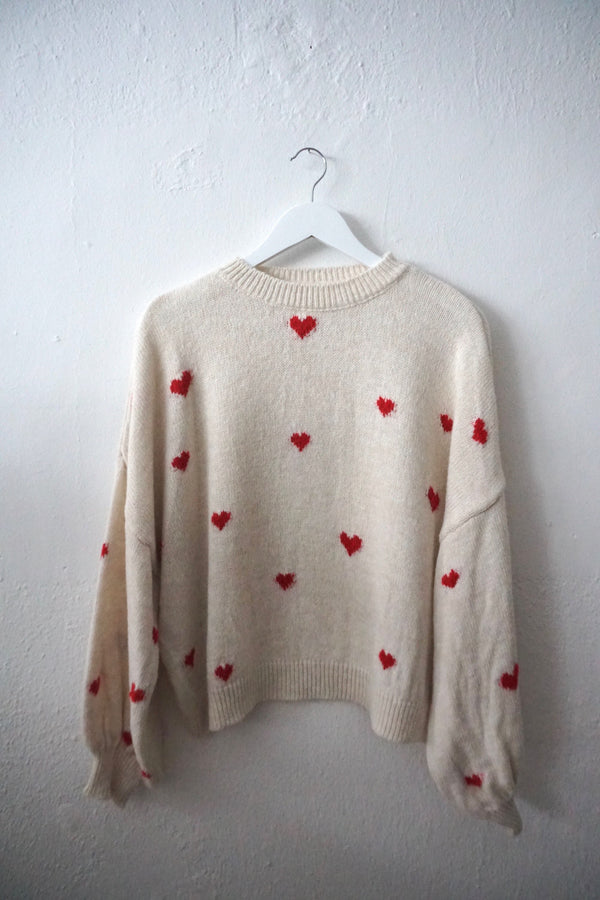 Knitted sweater hearts